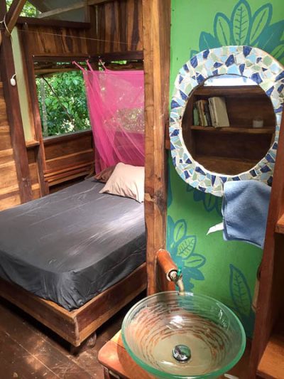 The bed with mosquito net at the Silverback Cabin on Isla Bastimentos.