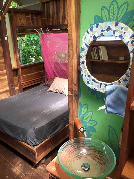 The bed with mosquito net at the Silverback Cabin on Isla Bastimentos.