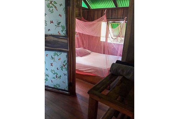 The bed at the Pantai Cabin.